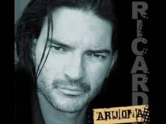 Singles Ricardo Arjona - Quien Diria video
